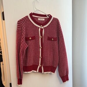 Red and White Sweater with Gold Accents